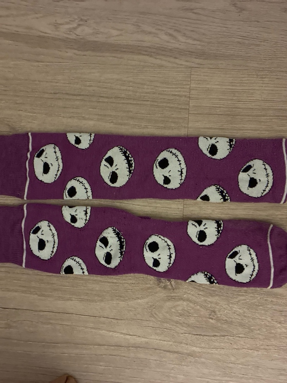 Disney Purple Knee-High Socks with White Skull Faces